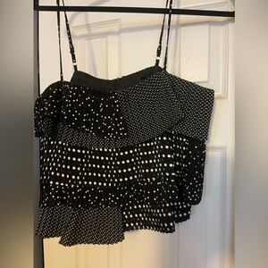 BLACK going out top